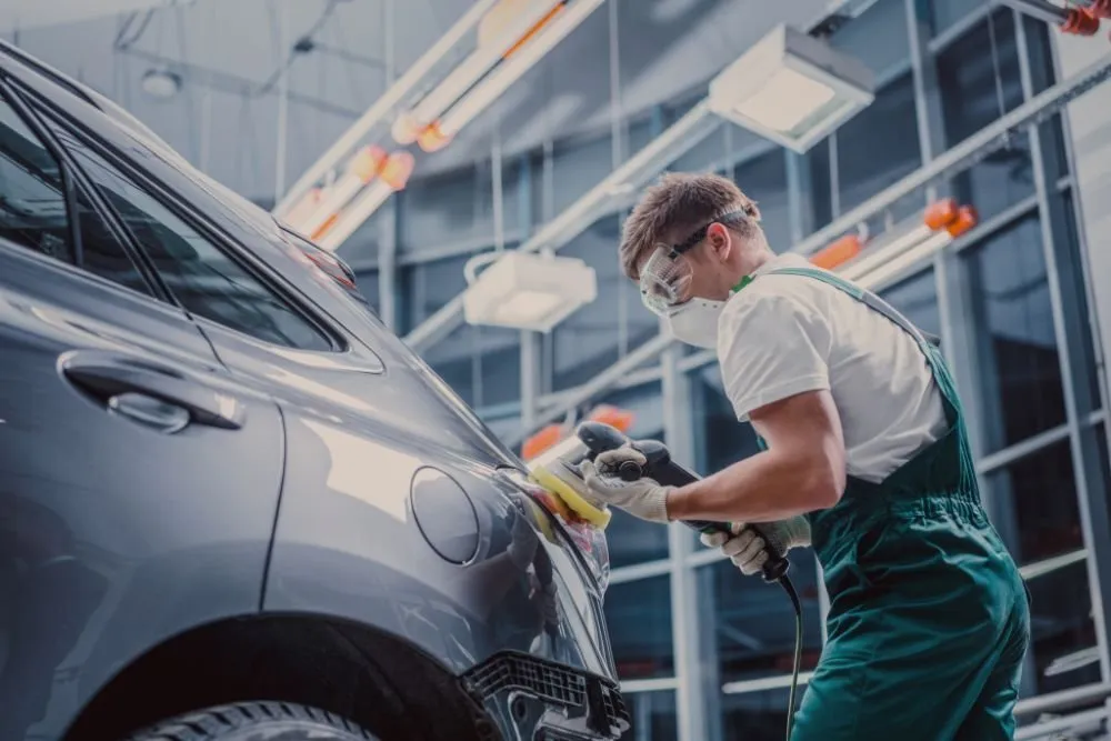 Mechanic doing a small car repair