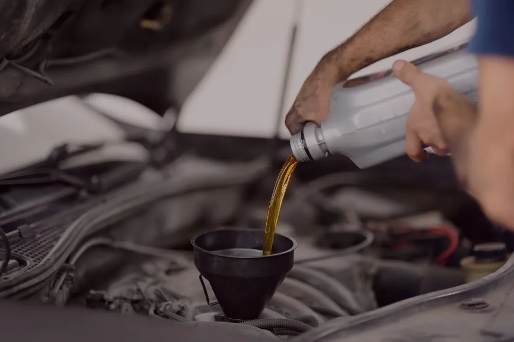 Mechanic working on a car engine